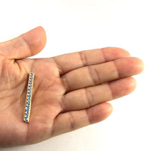 Load image into Gallery viewer, 14K Yellow Gold Fifteen-Stone Blue Topaz Pendant