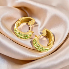 Load image into Gallery viewer, 14K Yellow Gold Omega Clip Peridot Channel Setting Earrings