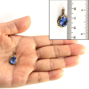 14K Yellow Gold Oval Blue Topaz Pendant