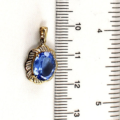 14K Yellow Gold Oval Blue Topaz Pendant