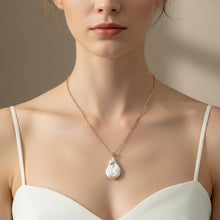 Load image into Gallery viewer, Baroque Coin Pearl Pendant – 14k Yellow Gold Rabbit-Ear Diamond Bail