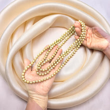 Load image into Gallery viewer, Champagne Freshwater Pearl Infinity Necklace – 60” Hand Knotted