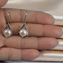 Load image into Gallery viewer, Sterling Silver Wave Hook Earrings with White Pearls