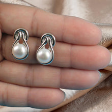 Load image into Gallery viewer, Sterling Silver Love Knot White Pearl Stud Earrings