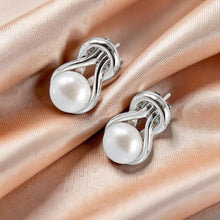 Load image into Gallery viewer, Sterling Silver Love Knot White Pearl Stud Earrings