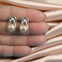 Load image into Gallery viewer, Solid Sterling Silver Love Knot Pink Pearl Stud Earrings