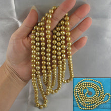 Load image into Gallery viewer, Champagne Freshwater Pearl Infinity Necklace – 60” Hand Knotted
