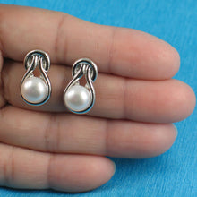 Load image into Gallery viewer, Sterling Silver Love Knot White Pearl Stud Earrings