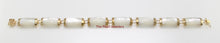 Load image into Gallery viewer, 14k Yellow Gold 8 Segments Mother of Pearl Bracelet with “Joy” Clasp