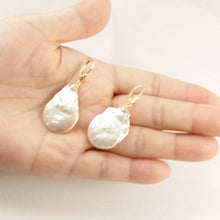 Load image into Gallery viewer, 14 k Yellow Gold Leverback Cup Baroque Coin Pearl Dangle Earrings