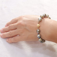 Load image into Gallery viewer, 7T00004C20-Unisex-14kt-YG-Clasp-Hand-Knot-Black-Tahitian-Pearl-Bracelet