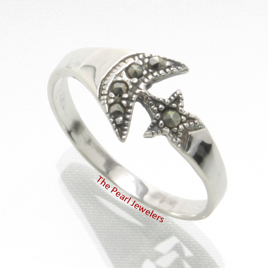 9305081-Sterling-Silver-Studded-Marcasite-Star-Moon-Design-Cocktail-Ring