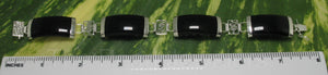 9410391-Sterling-Silver-Oriental-Symbol-Four-Black-Onyx-Bracelets