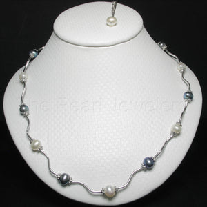 9609974-Fourteen-Black-White-Culture-Pearls-Necklace